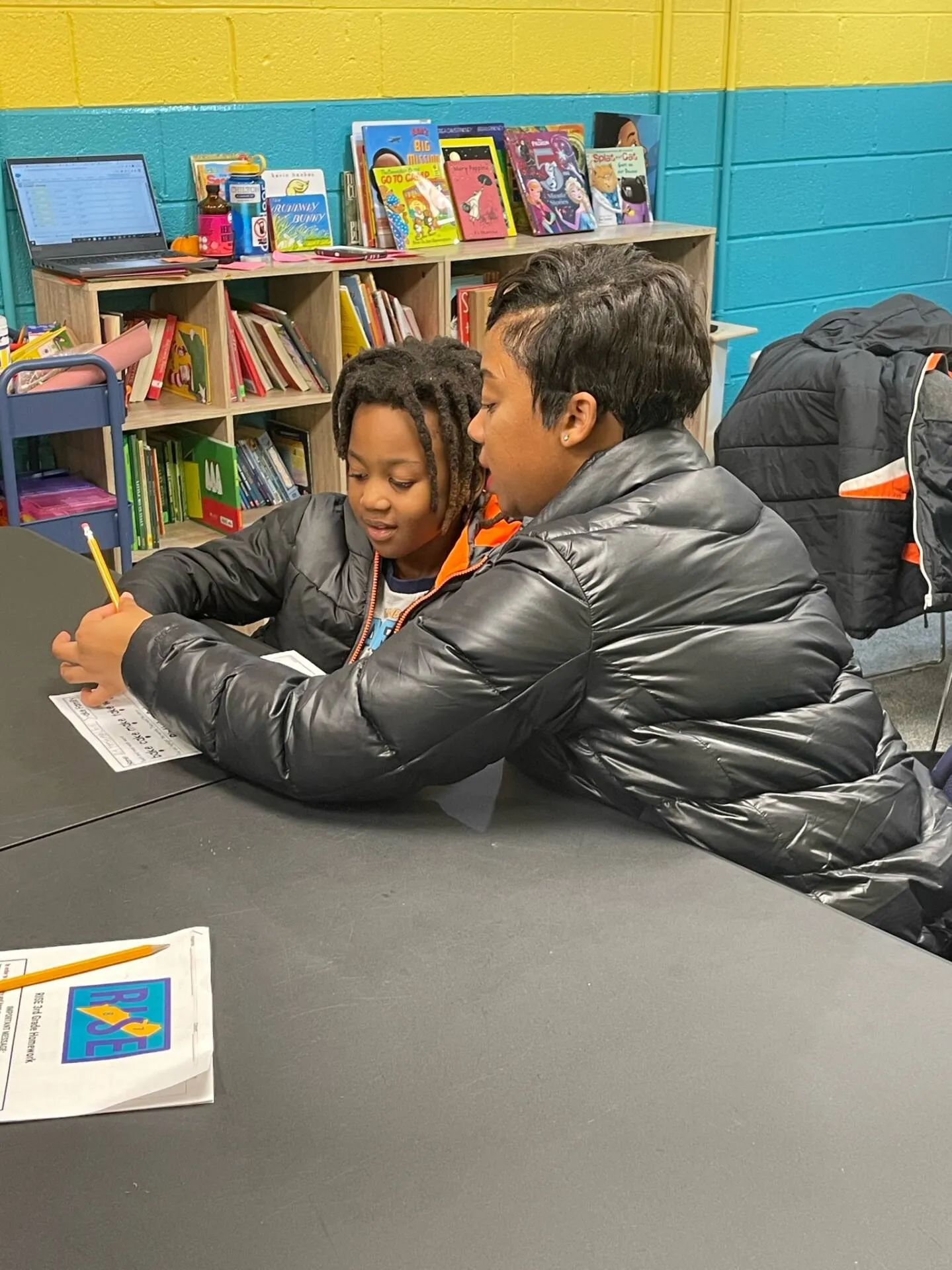 Tutor helps student with worksheet