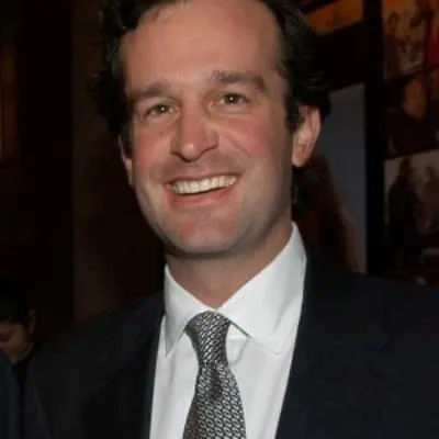 Formal portrait of a man wearing a suit