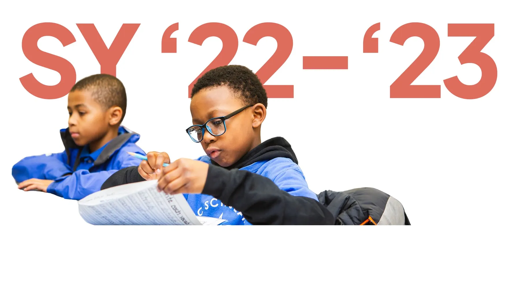 School year 2022–23 graphic with two children writing